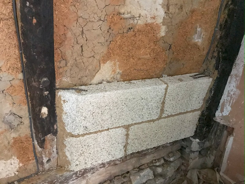 Hempcrete blocks in front of the daub