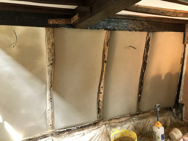 Clay and lime plaster reapplied to the walls