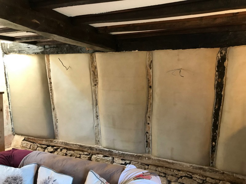 Clay and lime plaster reapplied to the walls